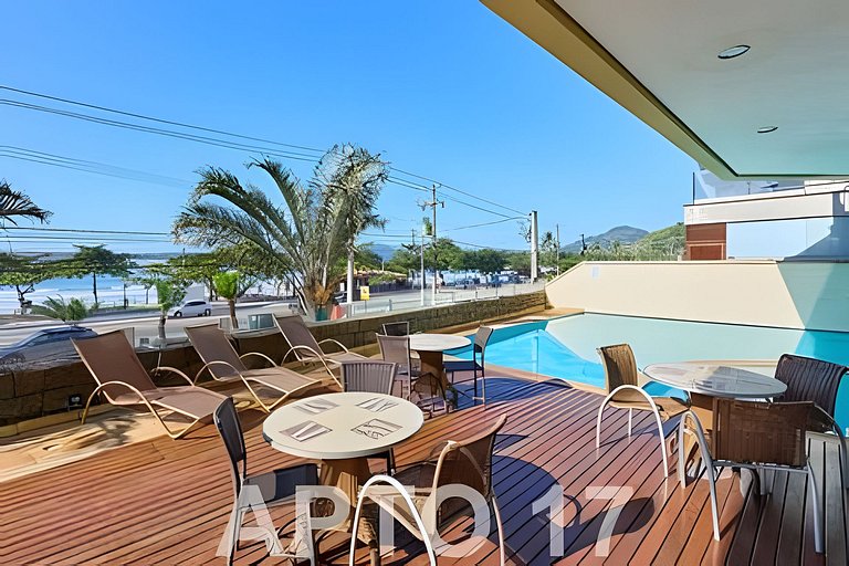 Pé na areia com AC, vista parcial da Praia Grande